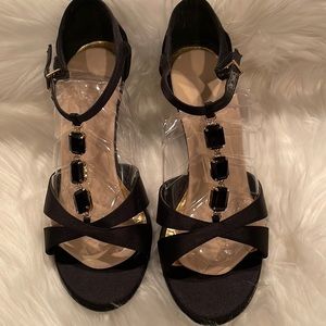 Black formal sandals with black and gold jewels